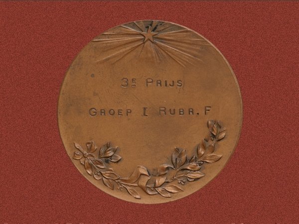 penninggroningenetalagewedstrijdgroningerwinkeliersvereniging1912keerzijde.jpg