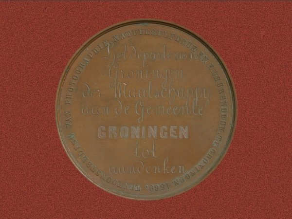 penningtentoonstellingvanphotographienatuurzelfdrukenkleurendruktegroningen1869keerzijde.jpg